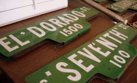 There are several old, local street signs.